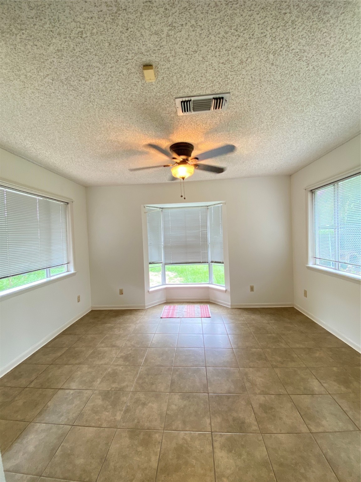 2233 Ripple Creek Drive Rosenberg, TX 77471 - Photo 16 of 39 a view of an empty room with a window