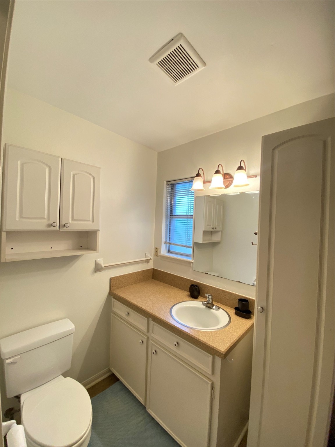 2233 Ripple Creek Drive Rosenberg, TX 77471 - Photo 24 of 39 a bathroom with a sink and a toilet
