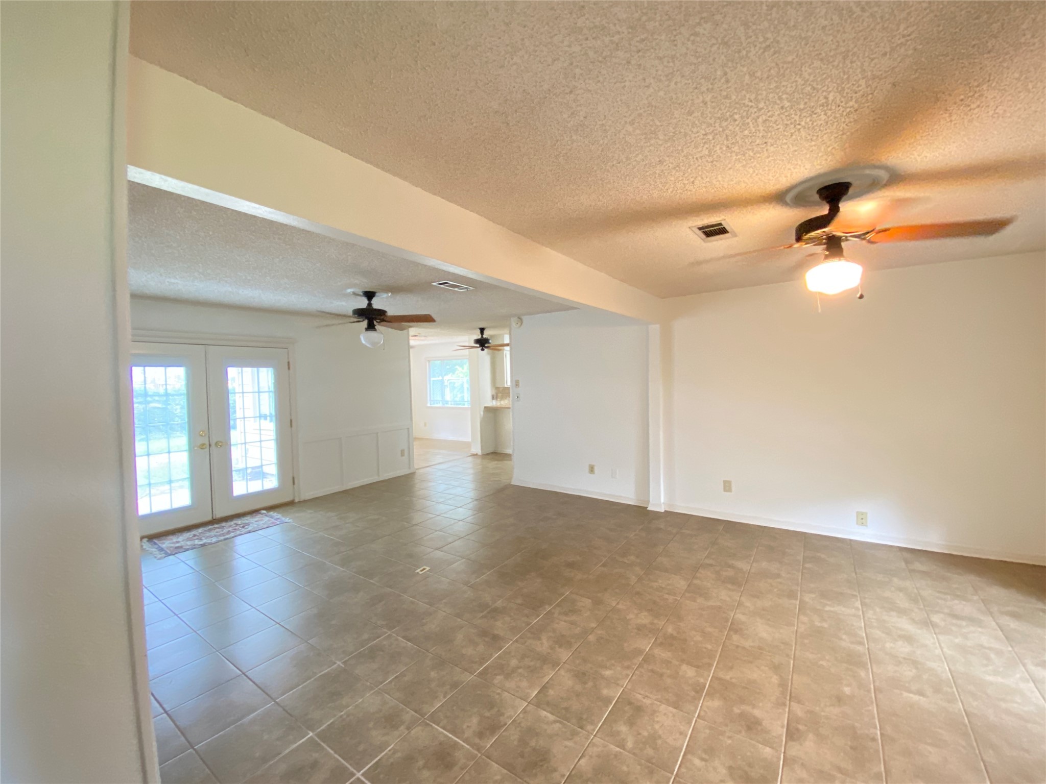 2233 Ripple Creek Drive Rosenberg, TX 77471 - Photo 7 of 39 a view of an empty room with a window