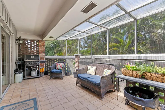 a outdoor living space with furniture and garden view