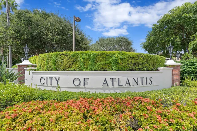 a sign that is sitting in front of a sign board