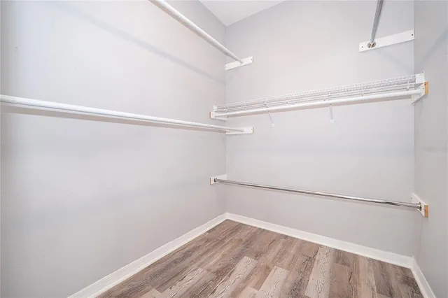 a view of an empty walk in closet