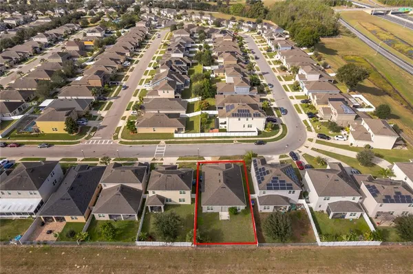 an aerial view of a highlighted house