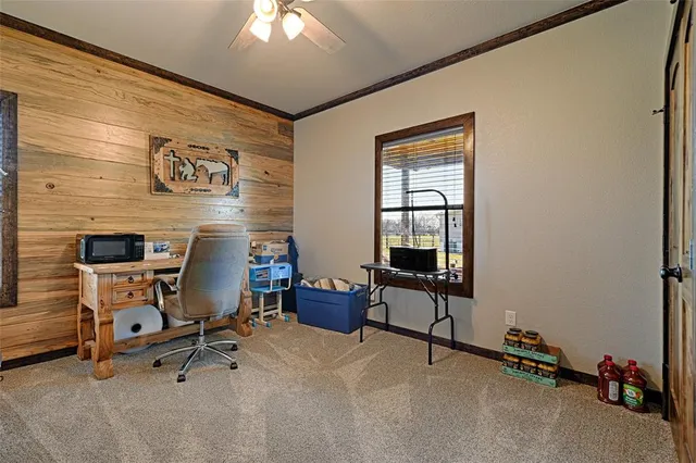 a view of a workspace with furniture