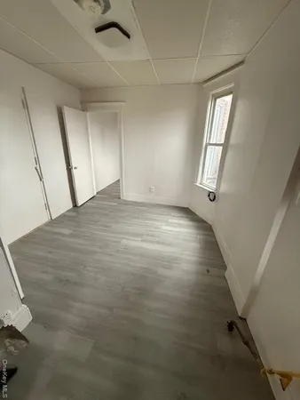 a utility room with sink dryer and washer