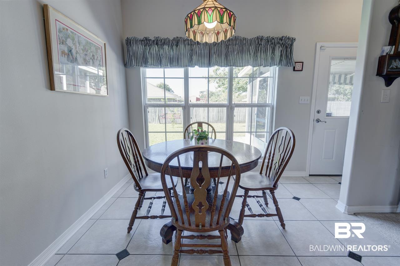 22195 Buck Road Robertsdale, AL 36567 - Photo 18 of 36 Walk out to Screened Patio from Kitchen