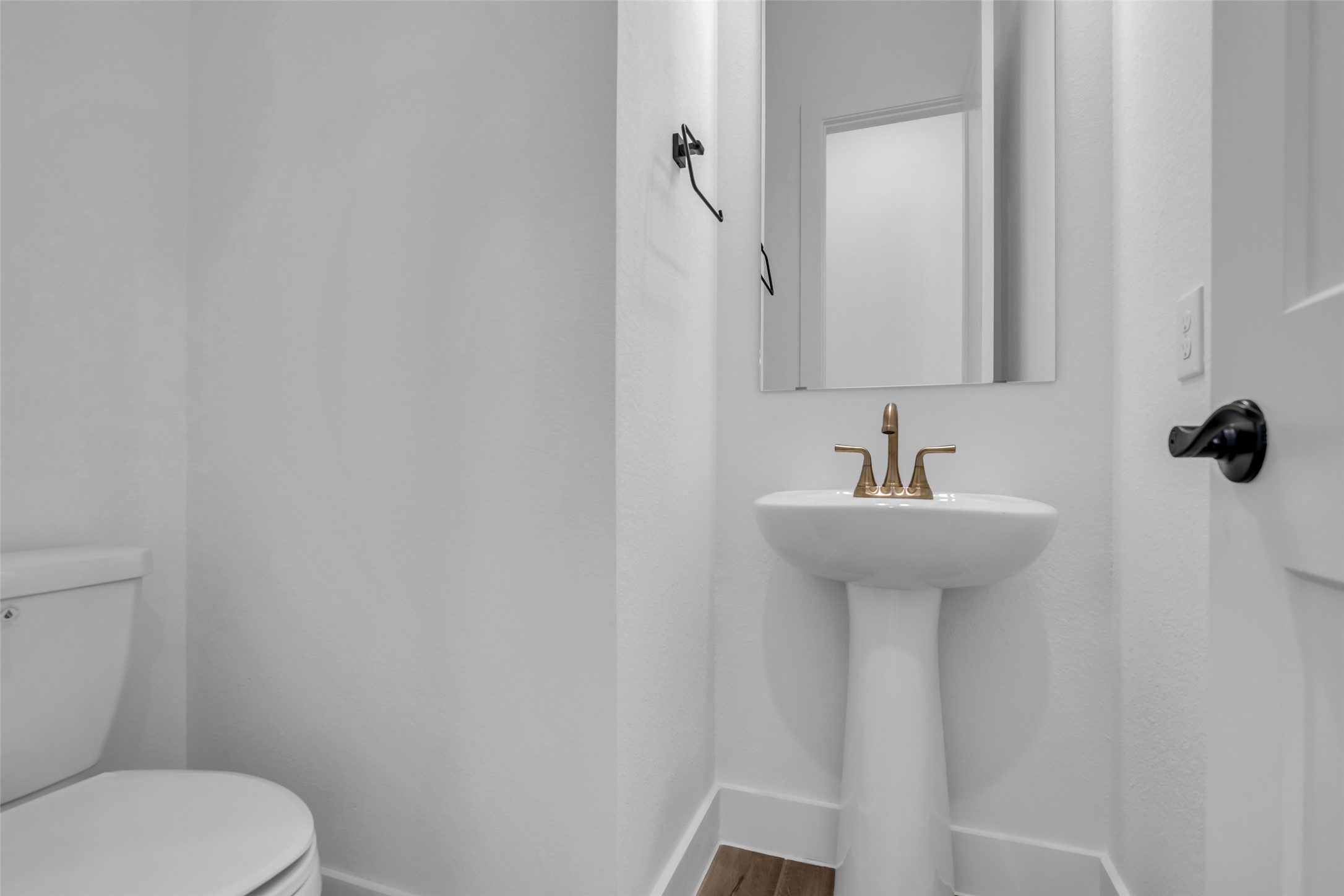 143 Afton June Drive Rosenberg, TX 77471 - Photo 8 of 25 a bathroom with a sink toilet and mirror