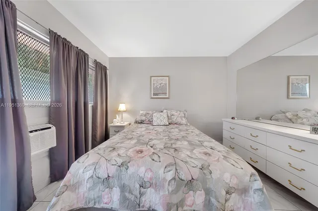 a bedroom with a bed and a closet