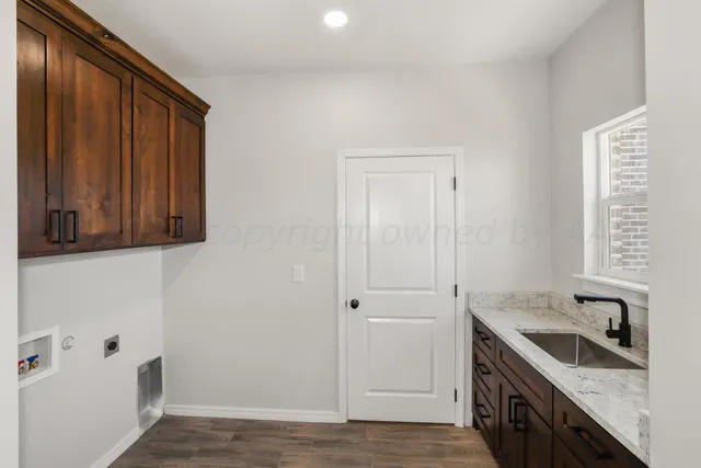 a view with a sink and a window