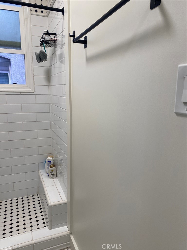 325 Elm Avenue, Unit 106 Long Beach, CA 90802 - Photo 7 of 9 a bathroom with a shower