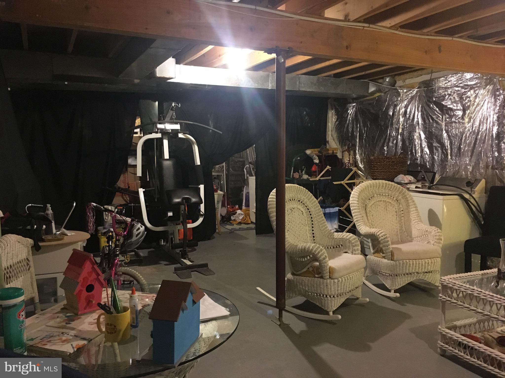 7110 Rutherford Green Circle Baltimore, MD 21244 - Photo 24 of 26 a room with gym equipment