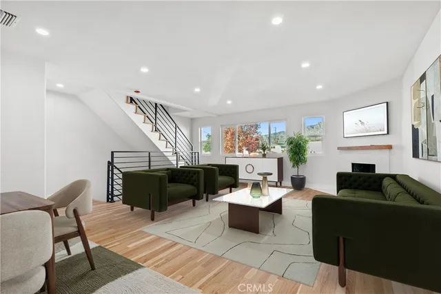 a living room with furniture and a couch