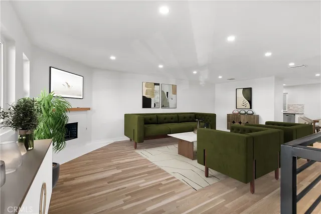 a kitchen with stainless steel appliances granite countertop a stove a refrigerator and a sink