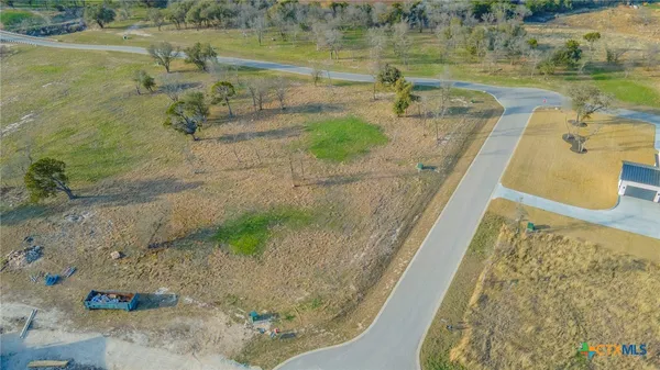 a view of a swimming pool and an outdoor space