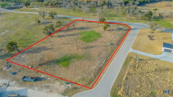 a view of a road and ocean view
