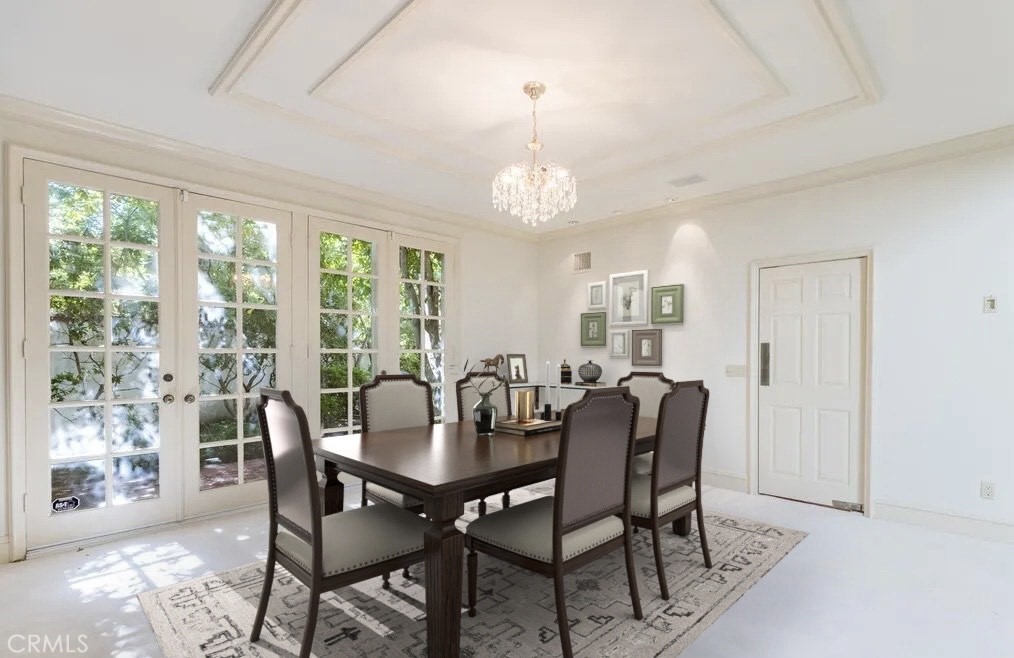 12386 Ridge Circle Los Angeles, CA 90049 - Photo 17 of 56 a view of a dining room with furniture window and outside view