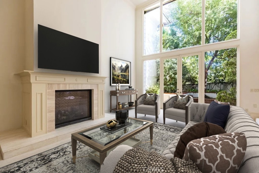 12386 Ridge Circle Los Angeles, CA 90049 - Photo 20 of 56 a living room with furniture a flat screen tv and a fireplace