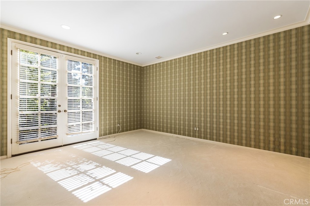 12386 Ridge Circle Los Angeles, CA 90049 - Photo 27 of 56 a view of an empty room with a window