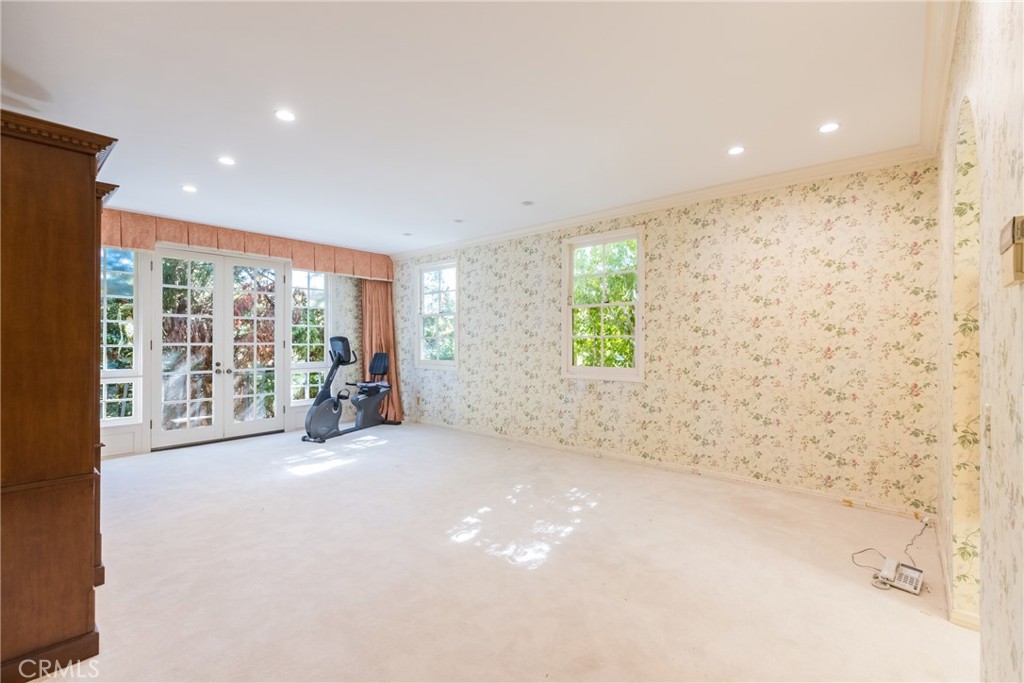 12386 Ridge Circle Los Angeles, CA 90049 - Photo 33 of 56 a view of an empty room with a window
