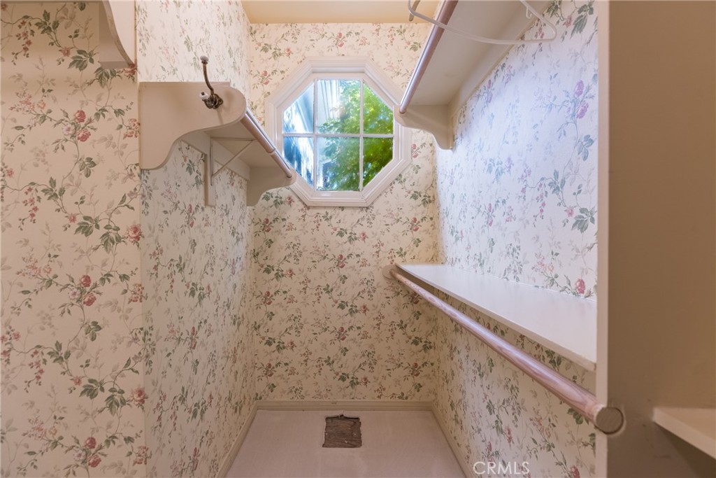 12386 Ridge Circle Los Angeles, CA 90049 - Photo 37 of 56 a bathroom with a window