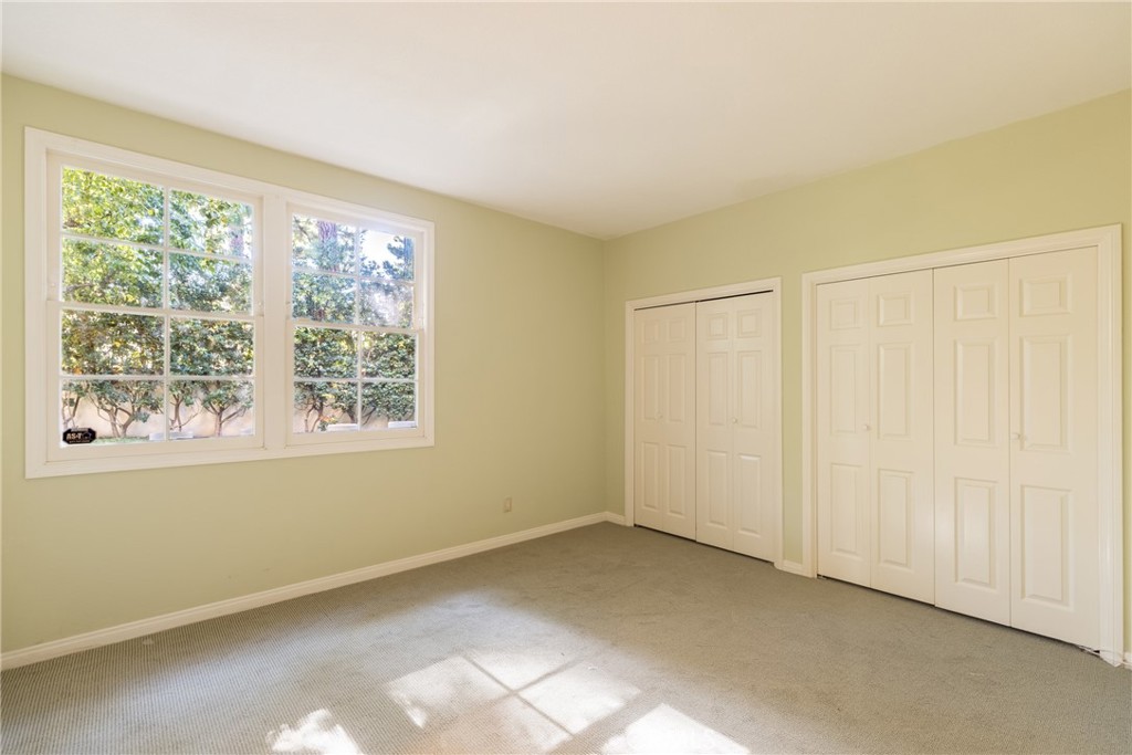 12386 Ridge Circle Los Angeles, CA 90049 - Photo 44 of 56 an empty room with a window
