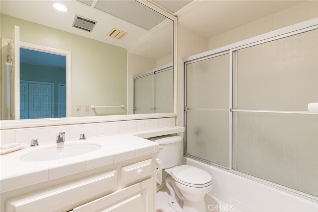 12386 Ridge Circle Los Angeles, CA 90049 - Photo 45 of 56 a bathroom with a sink toilet and shower