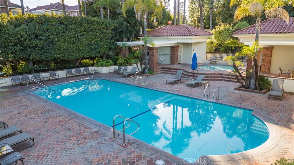 12386 Ridge Circle Los Angeles, CA 90049 - Photo 52 of 56 a view of a swimming pool with a patio