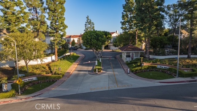 12386 Ridge Circle Los Angeles, CA 90049 - Photo 56 of 56 a view of a park with swings and slides