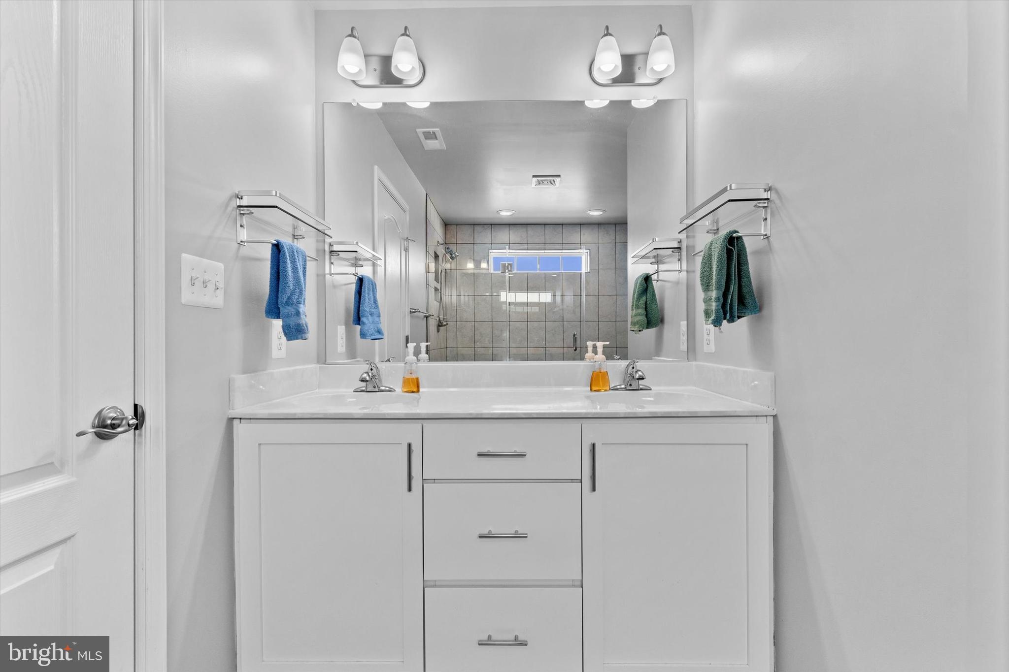 138 Pheasant Ridge Road Hanover, PA 17331 - Photo 23 of 45 a bathroom with a sink vanity and mirror