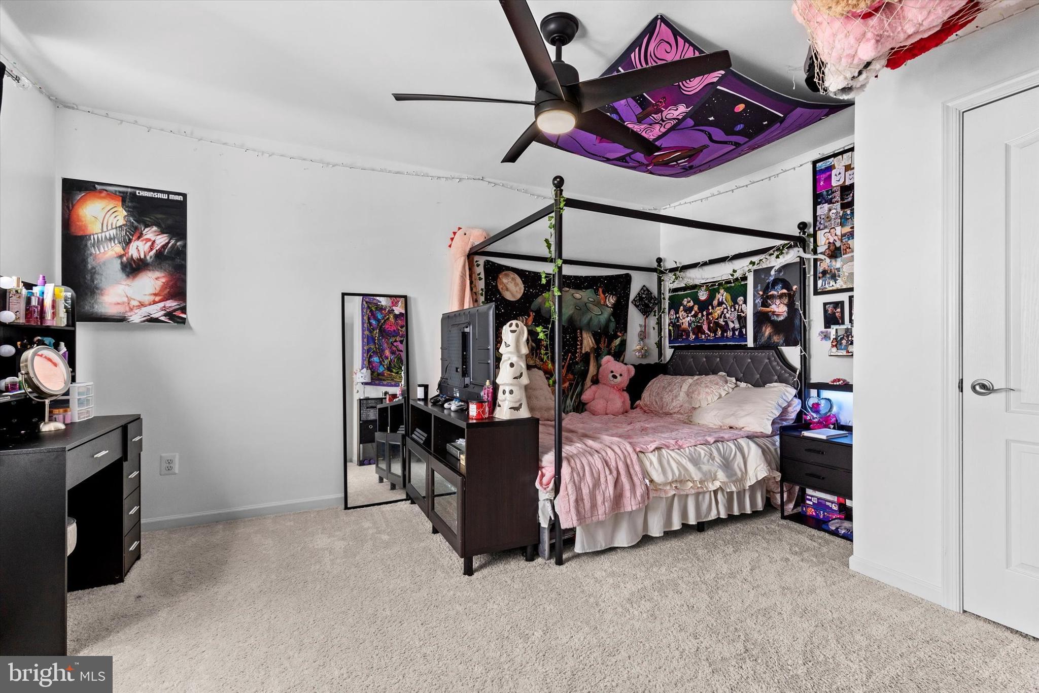 138 Pheasant Ridge Road Hanover, PA 17331 - Photo 30 of 45 a bedroom with a bed and a chandelier