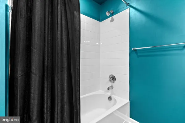 a bathroom with a bathtub