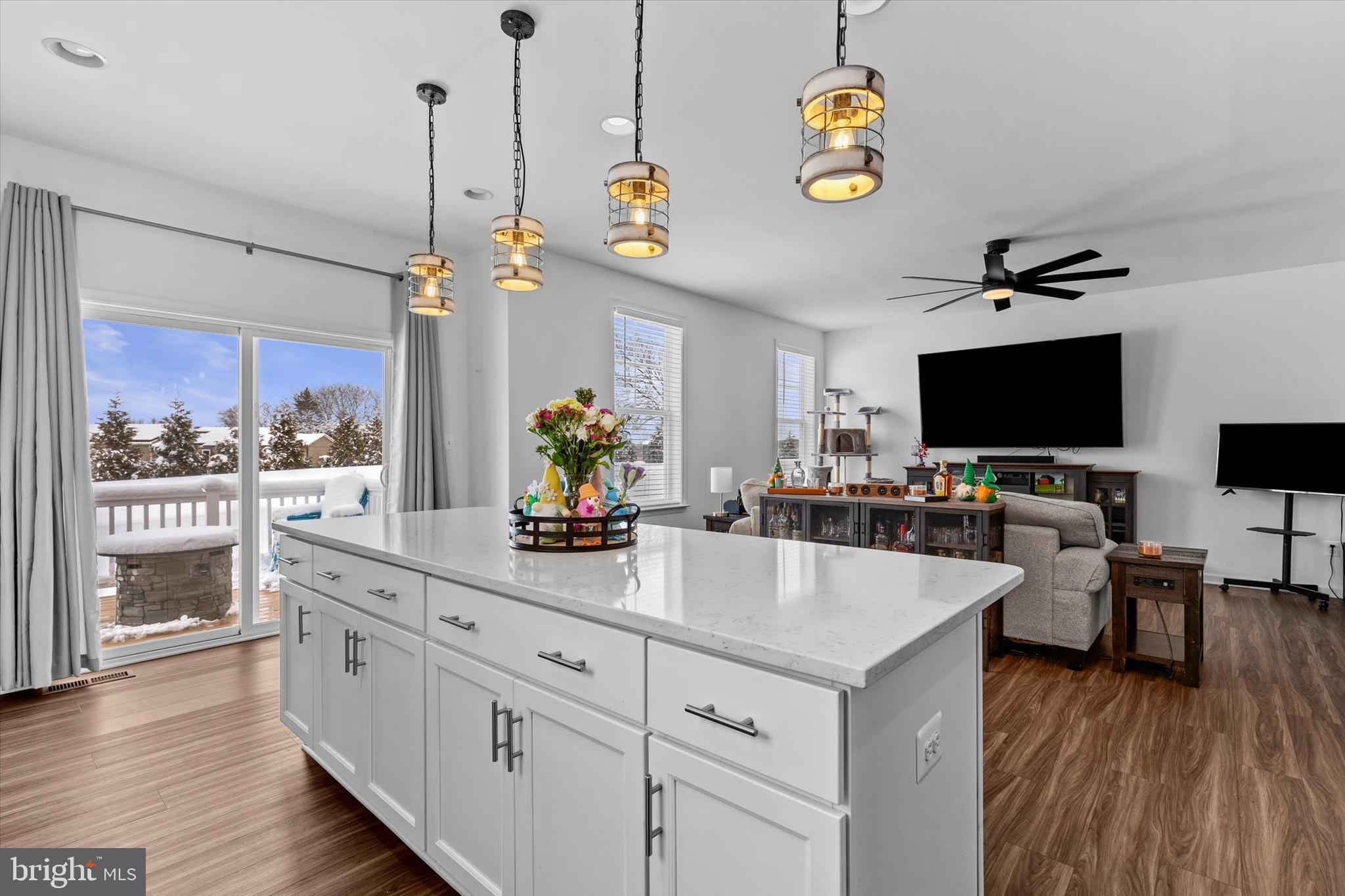 138 Pheasant Ridge Road Hanover, PA 17331 - Photo 9 of 45 a kitchen with stainless steel appliances granite countertop a stove and a wooden floors