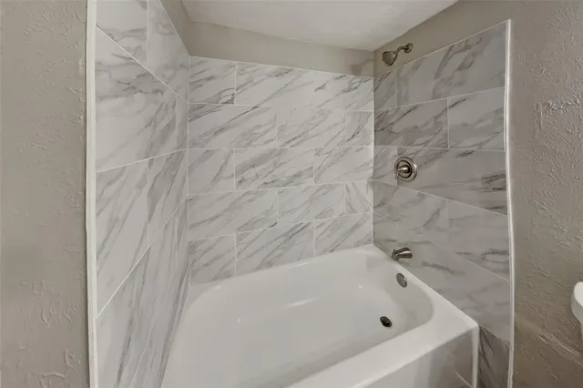 a bathroom with a bathtub