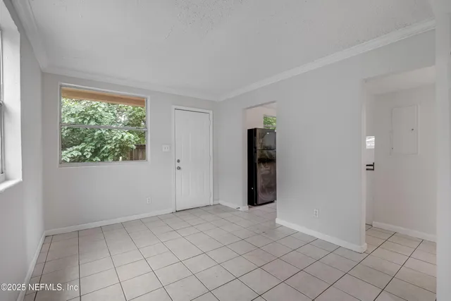 an empty room with windows