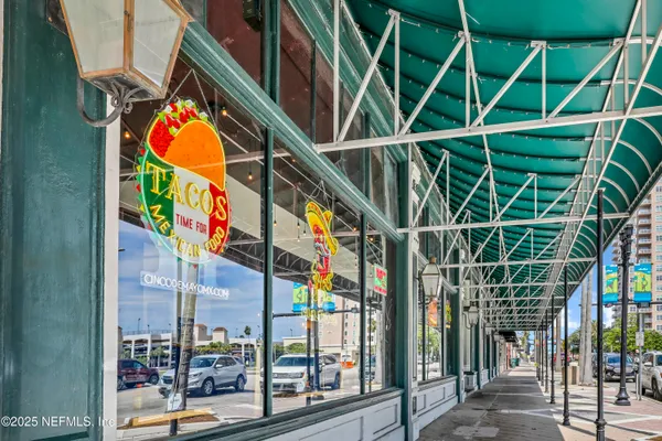 a patio with a table and chairs