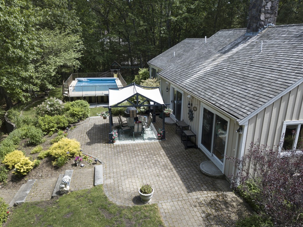 104 High Ridge Road Boxford, MA 01921 - Photo 8 of 30 an aerial view of a house with outdoor seating
