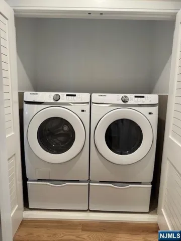 a view of an house with swimming pool and porch