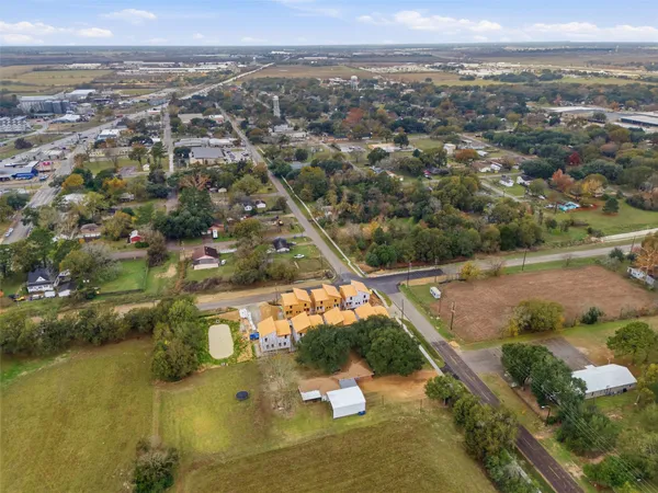 an aerial view of residential building with outdoor space