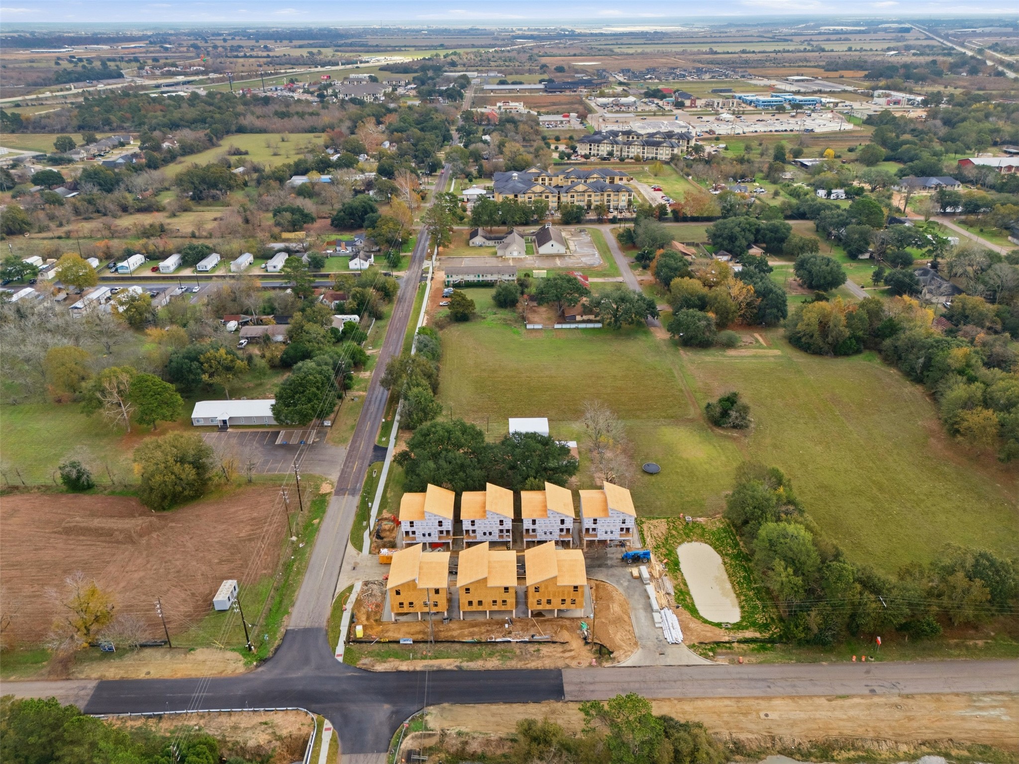 31921 Waller Tomball Road Waller, TX 77484 - Photo 31 of 32 an aerial view of a house with a lake view
