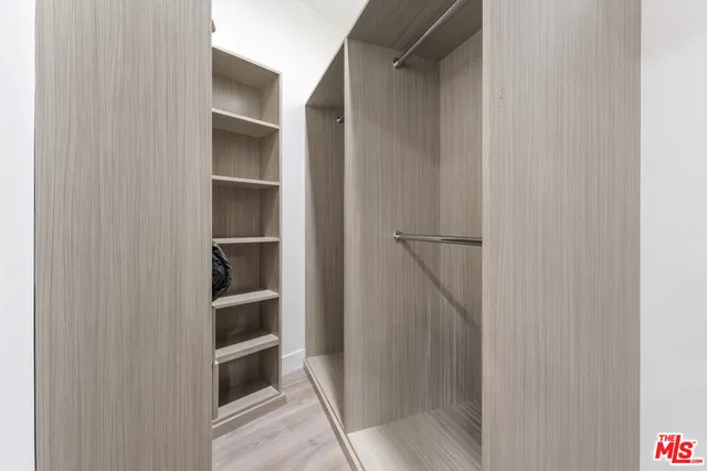 a view of a big yard with table and chairs