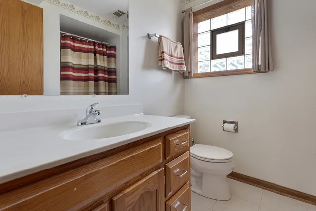 a bathroom with a sink and a toilet