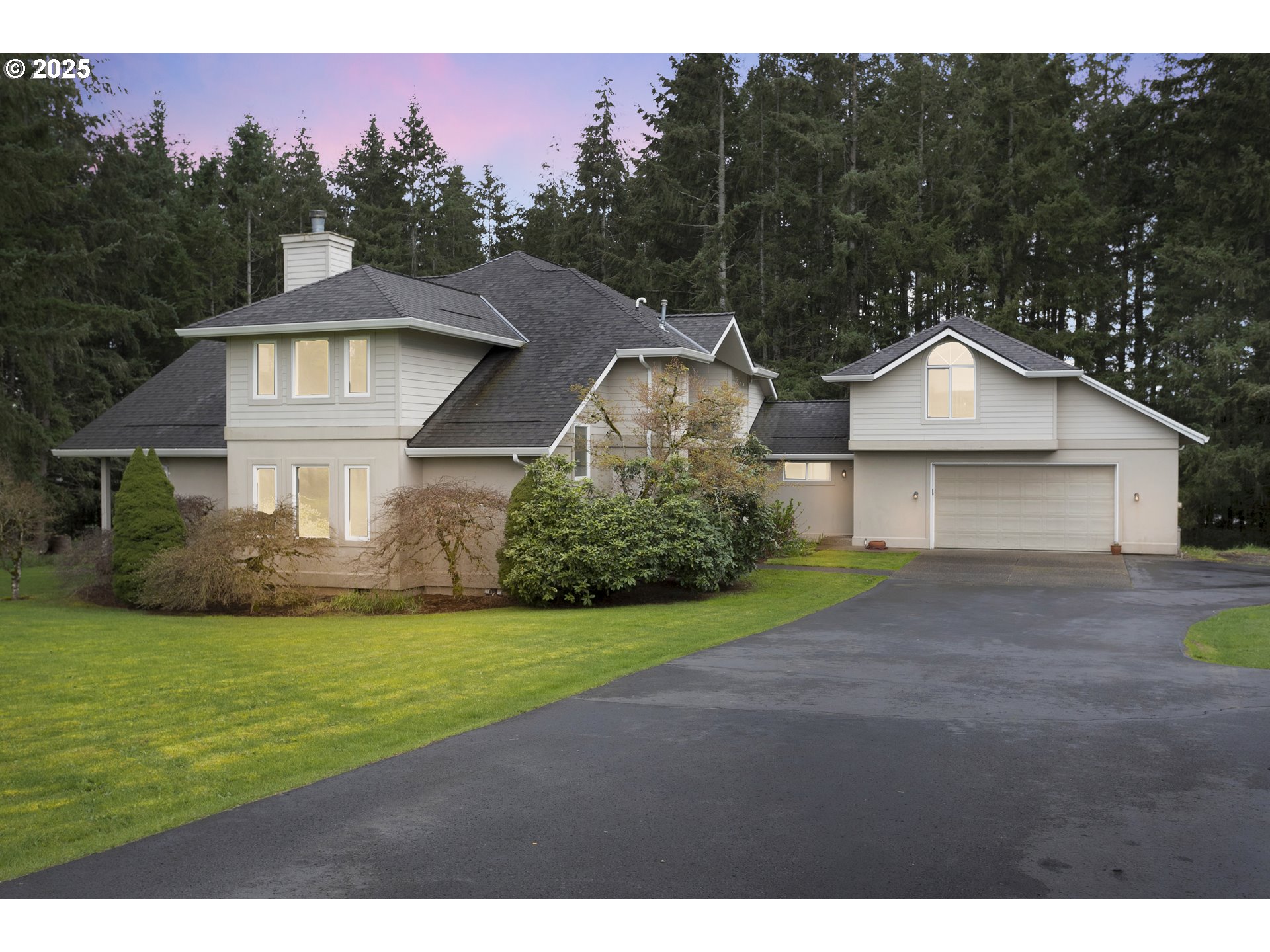 32370 Southeast Judd Road Eagle Creek, OR 97022 - Photo 1 of 48 a front view of a house with a yard and garage
