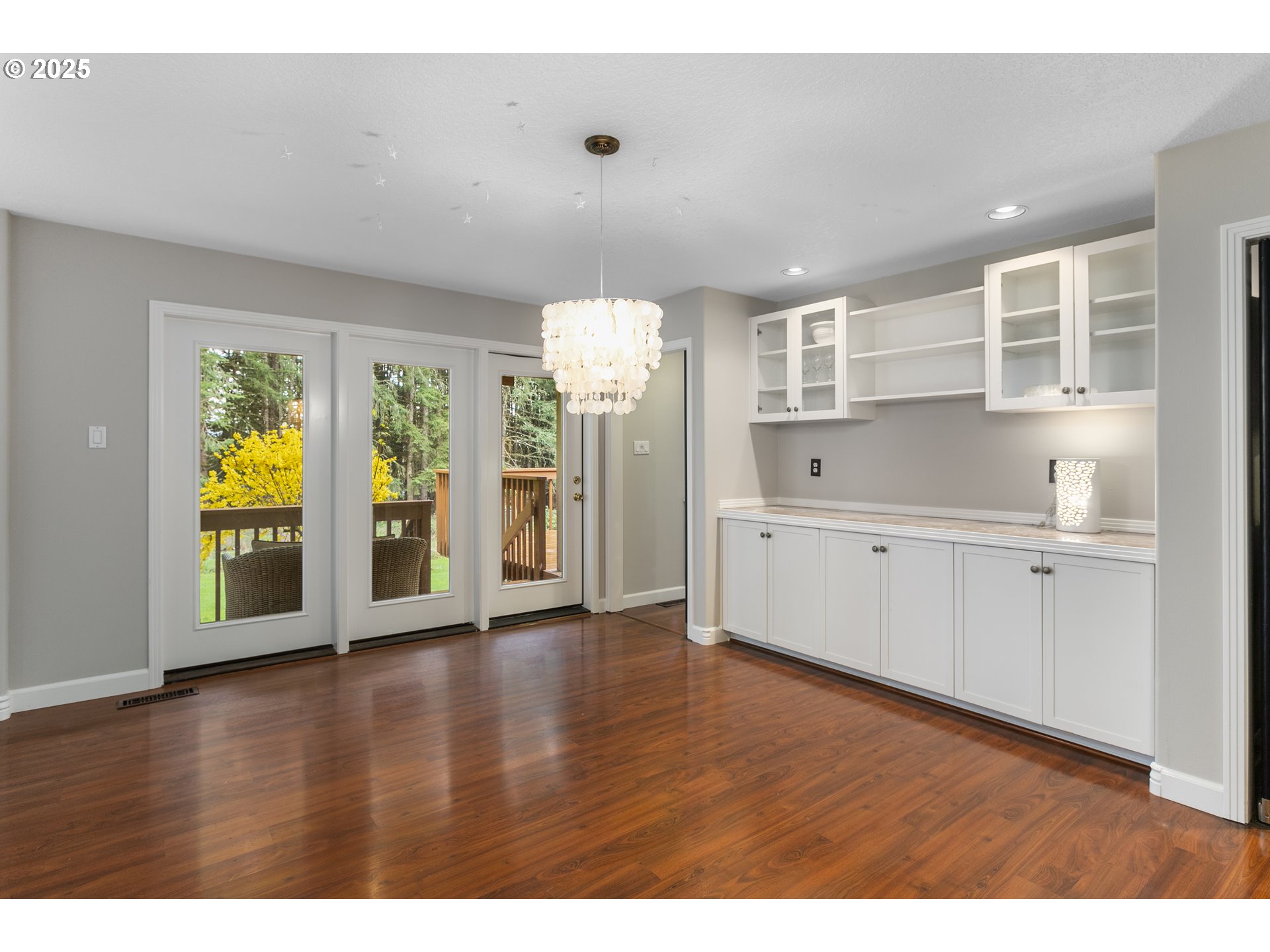 32370 Southeast Judd Road Eagle Creek, OR 97022 - Photo 13 of 48 a view of an empty room with a window and wooden floor