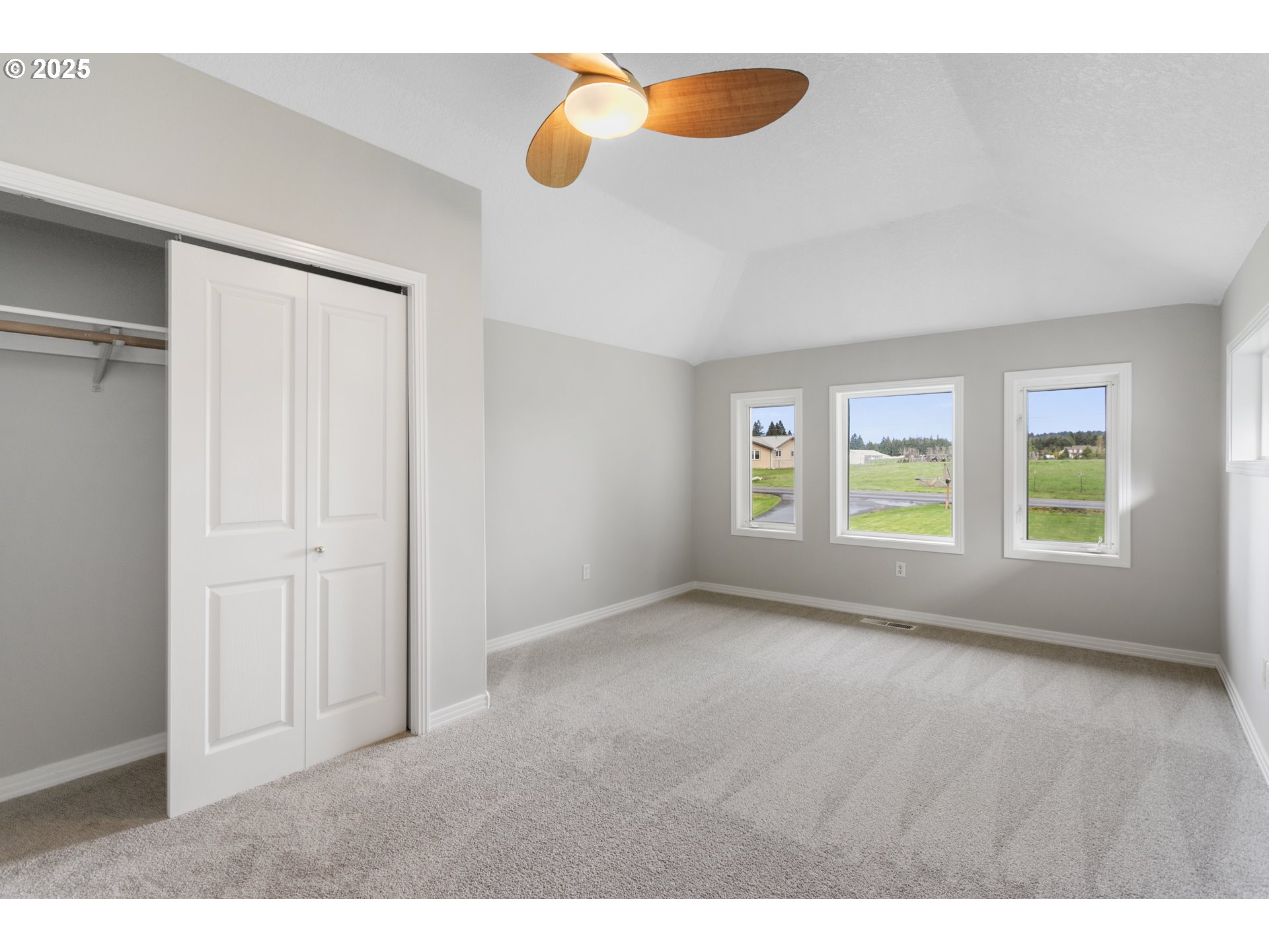 32370 Southeast Judd Road Eagle Creek, OR 97022 - Photo 39 of 48 a view of an empty room with window and wooden floor