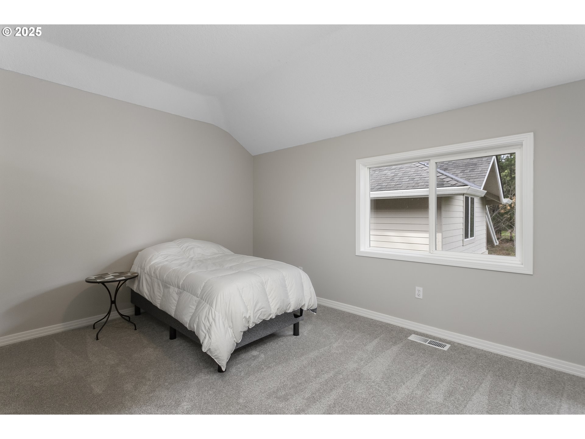 32370 Southeast Judd Road Eagle Creek, OR 97022 - Photo 41 of 48 a bedroom with a bed window and wall painting