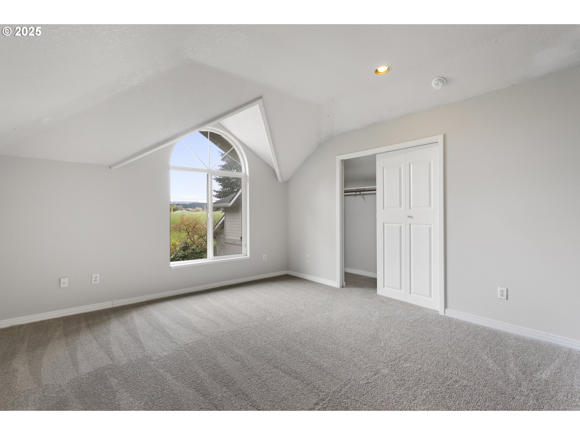 32370 Southeast Judd Road Eagle Creek, OR 97022 - Photo 46 of 48 a view of an empty room with window and wooden floor