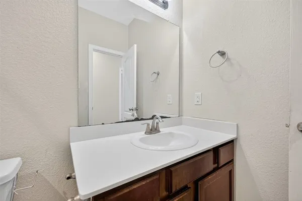 a bathroom with a sink and a toilet