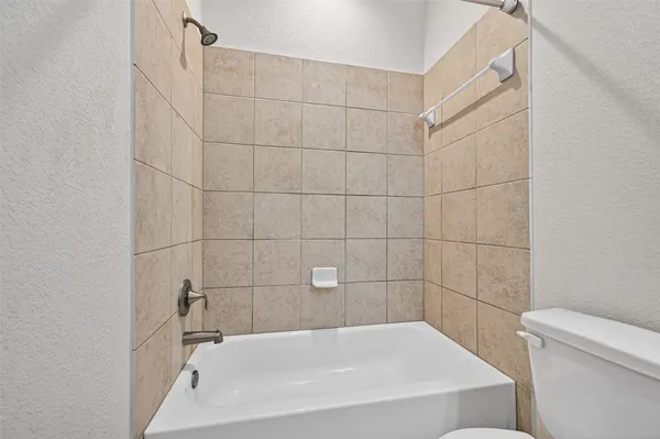 a bathroom with a bathtub