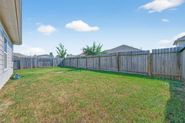 a view of a backyard with a garden