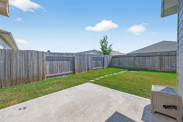 a view of a backyard with a garden